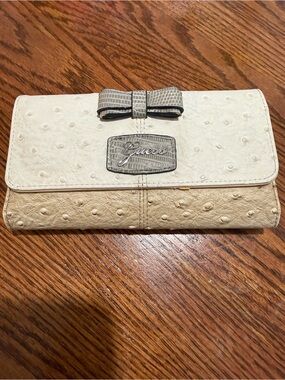 GUESS Cream and Taupe Faux-Ostrich Bow Wallet Clutch